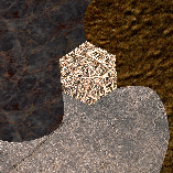 Figure 2: Natural texture mosaic (marble, sand, grass, stone) and its segmentation